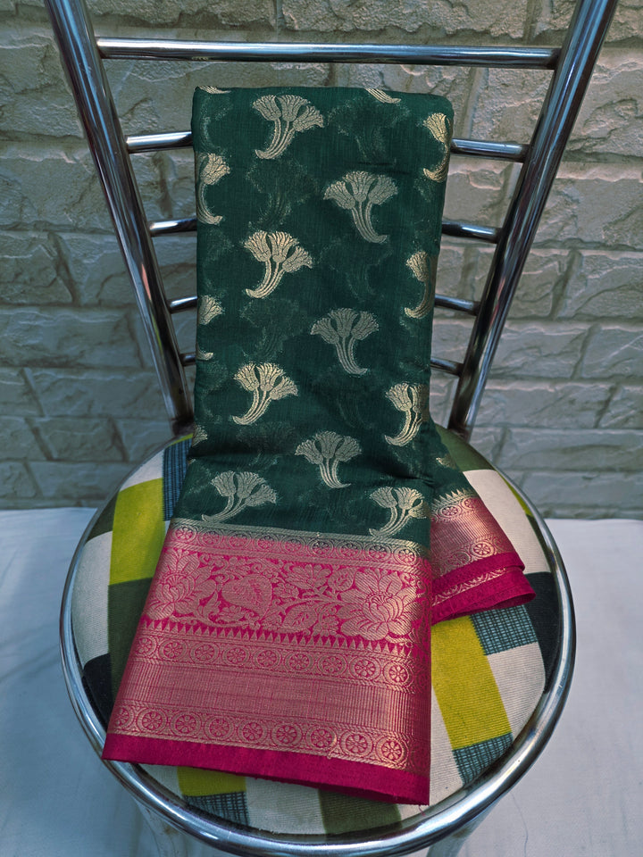BANARASI SILK IN BOTTLE GREEN WITH RED BORDER