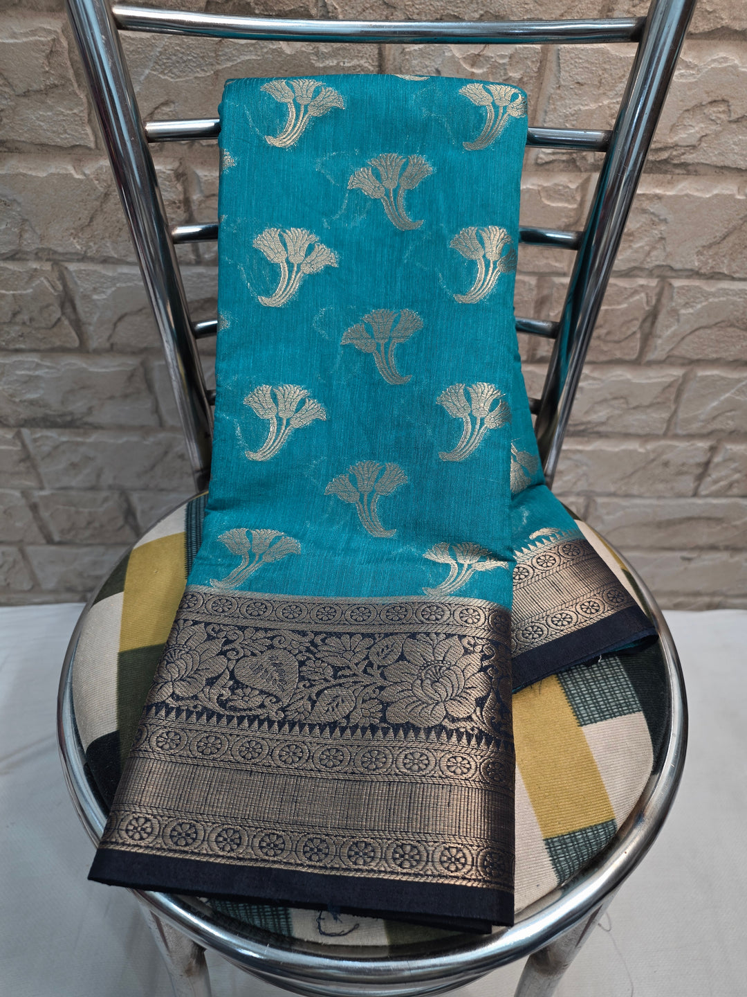 BANARASI SILK IN TEAL BLUE WITH NAVY BLUE BOREDR
