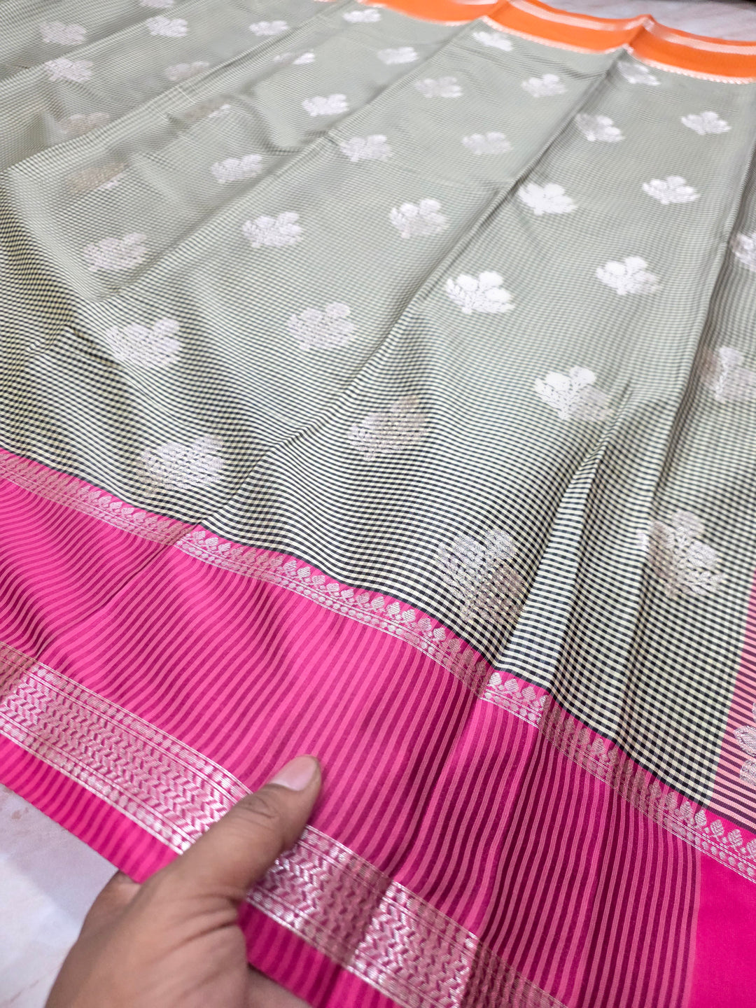 BANARASI KATAN PATTU WITH UNIFORM CHECKS IN ORANGE AND PINK BORDERS