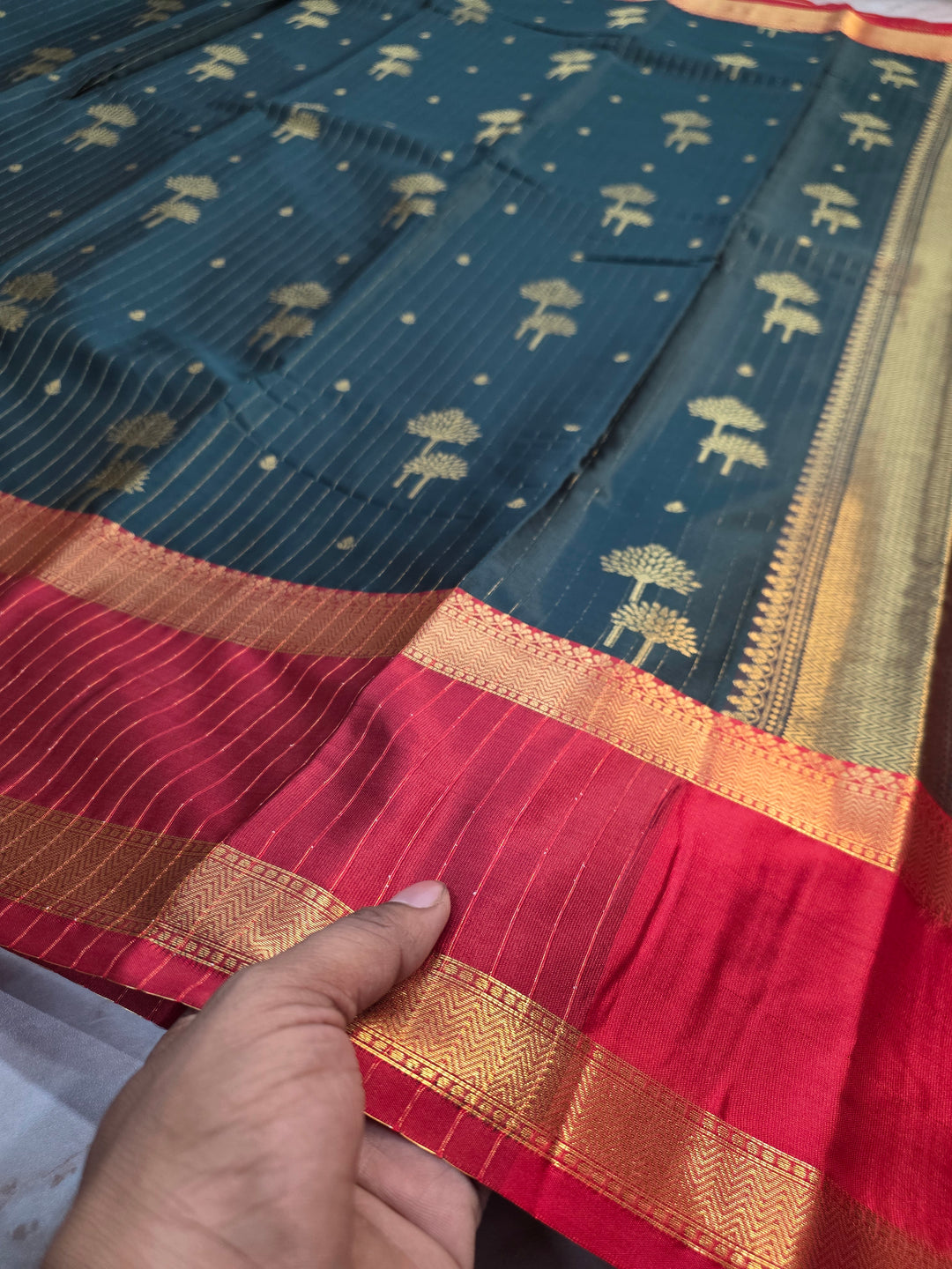 BANARASI KATAN PATTU IN BOTTLE GREEN WITH RED BORDER