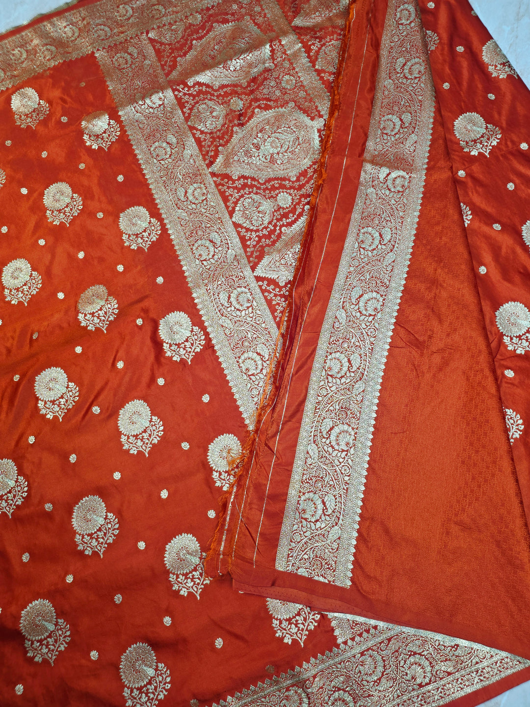 MASHRU KATAN SILK IN ORANGE WITH GOLD ZARI WORK BOOTA