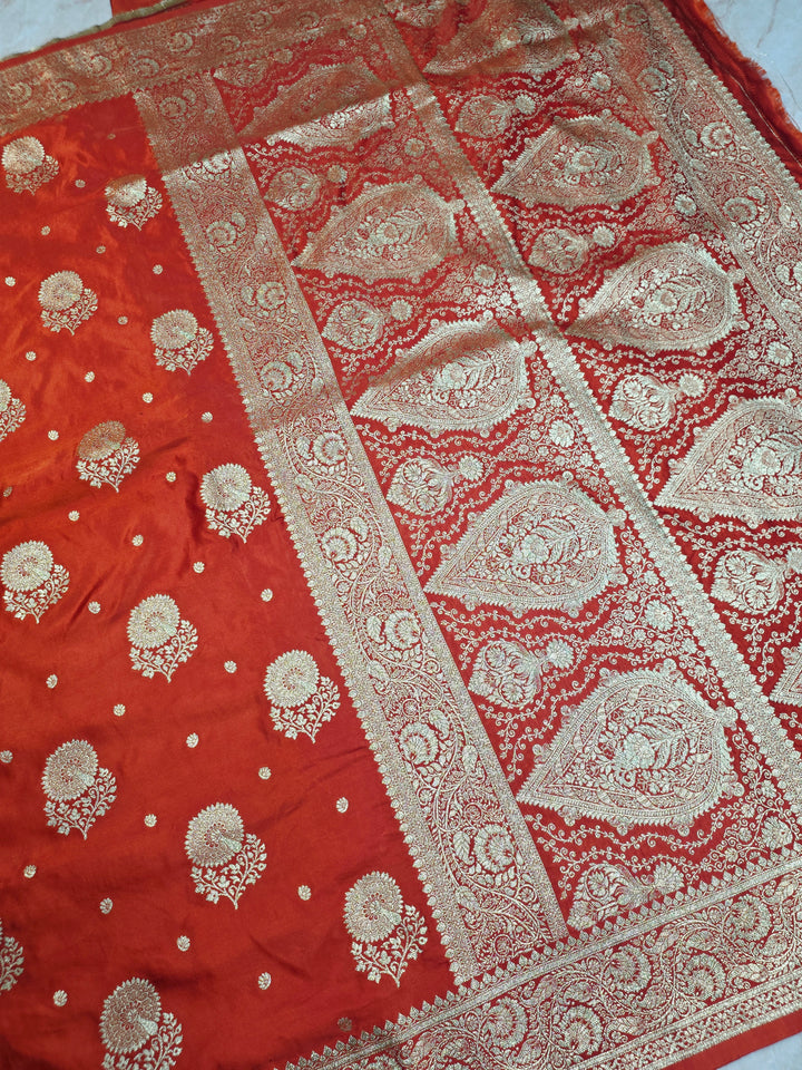 MASHRU KATAN SILK IN ORANGE WITH GOLD ZARI WORK BOOTA