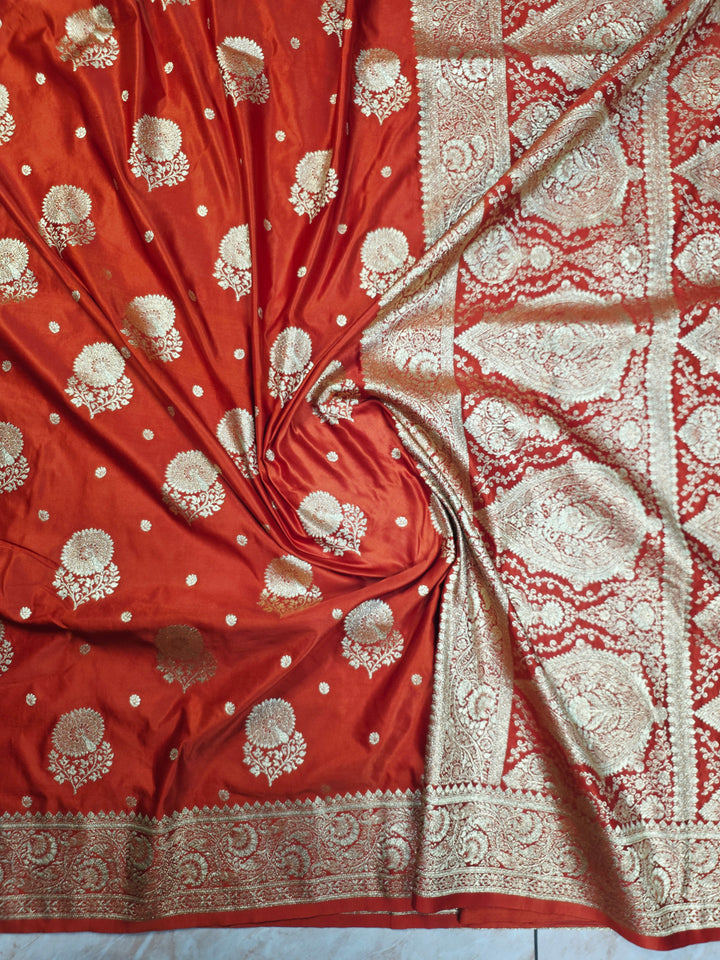 MASHRU KATAN SILK IN ORANGE WITH GOLD ZARI WORK BOOTA