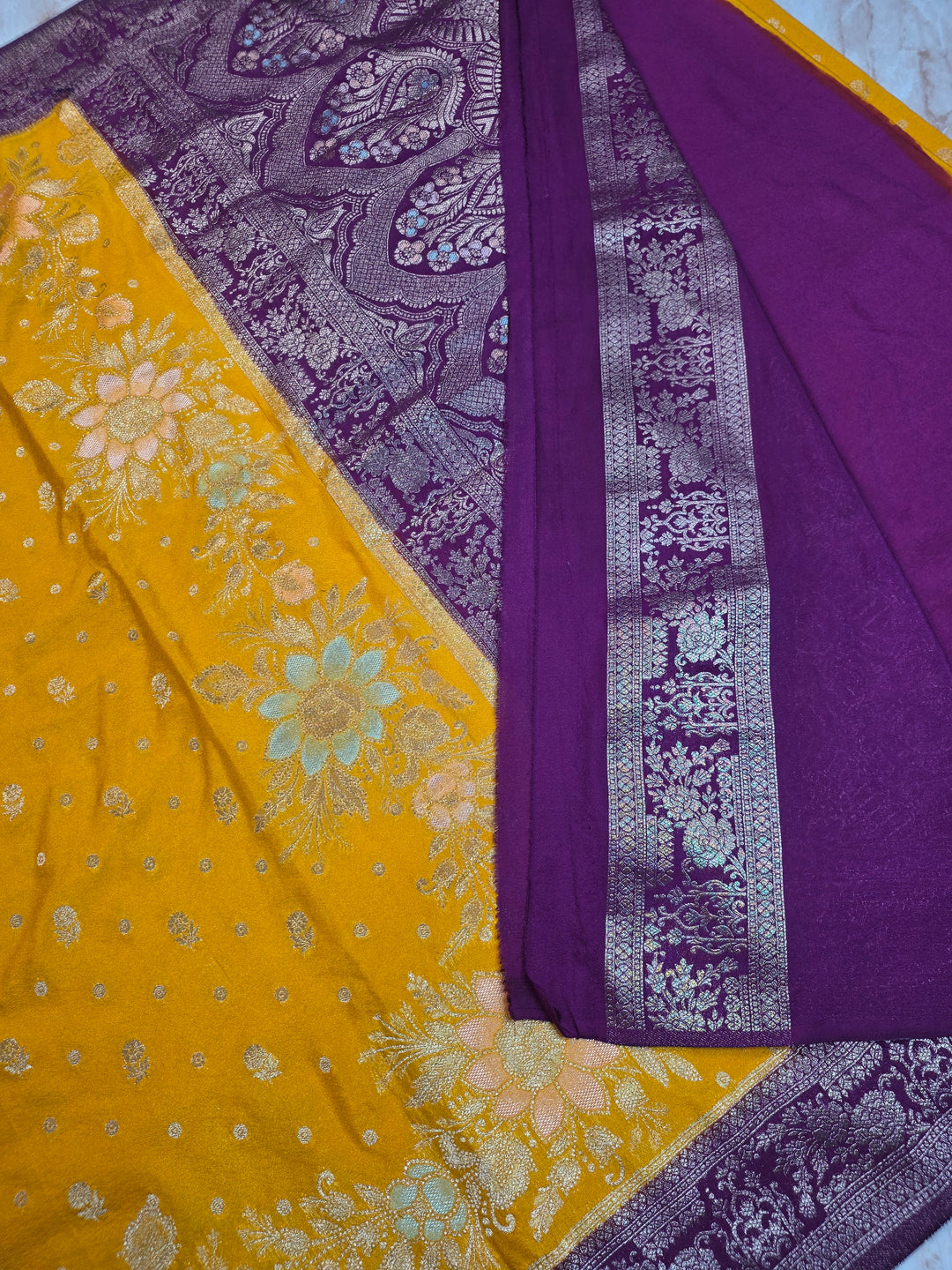 KHADDI GEORGETTE IN AIRY GOLD WITH MAGENTA BORDER