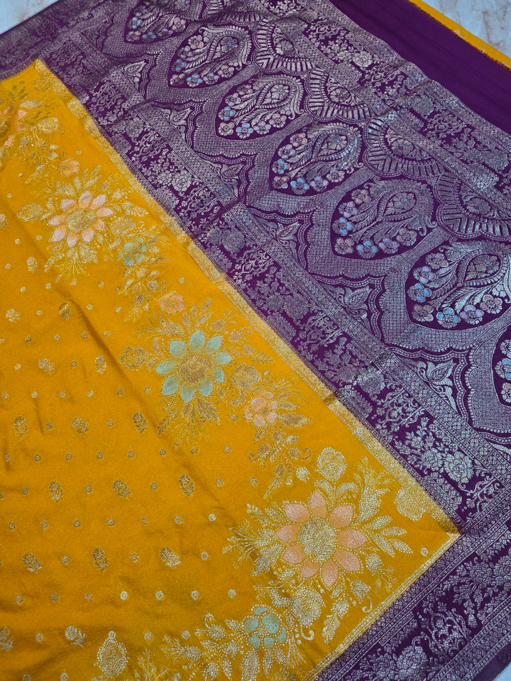 KHADDI GEORGETTE IN AIRY GOLD WITH MAGENTA BORDER