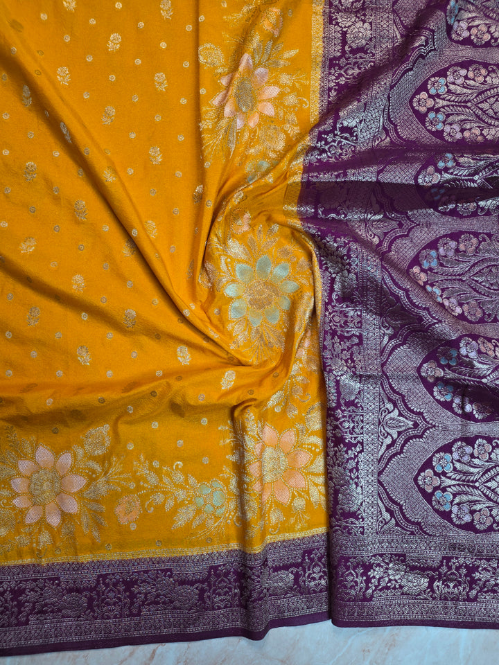 KHADDI GEORGETTE IN AIRY GOLD WITH MAGENTA BORDER