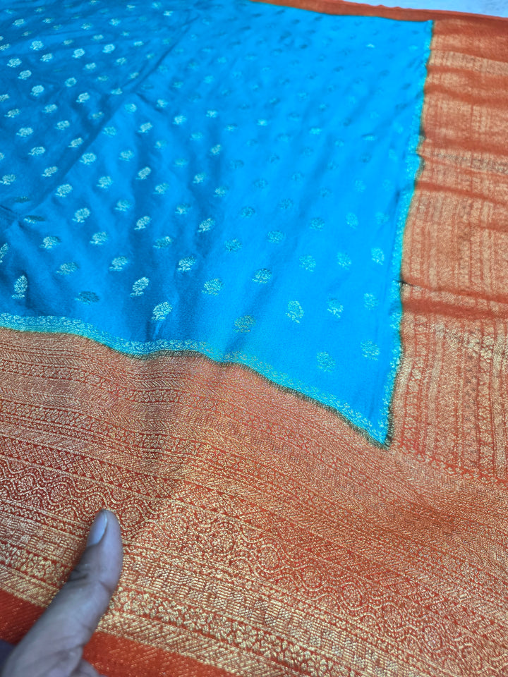 KHADDI GEROGETTE IN TORQUOISE BLUE WITH ORANGE BORDER