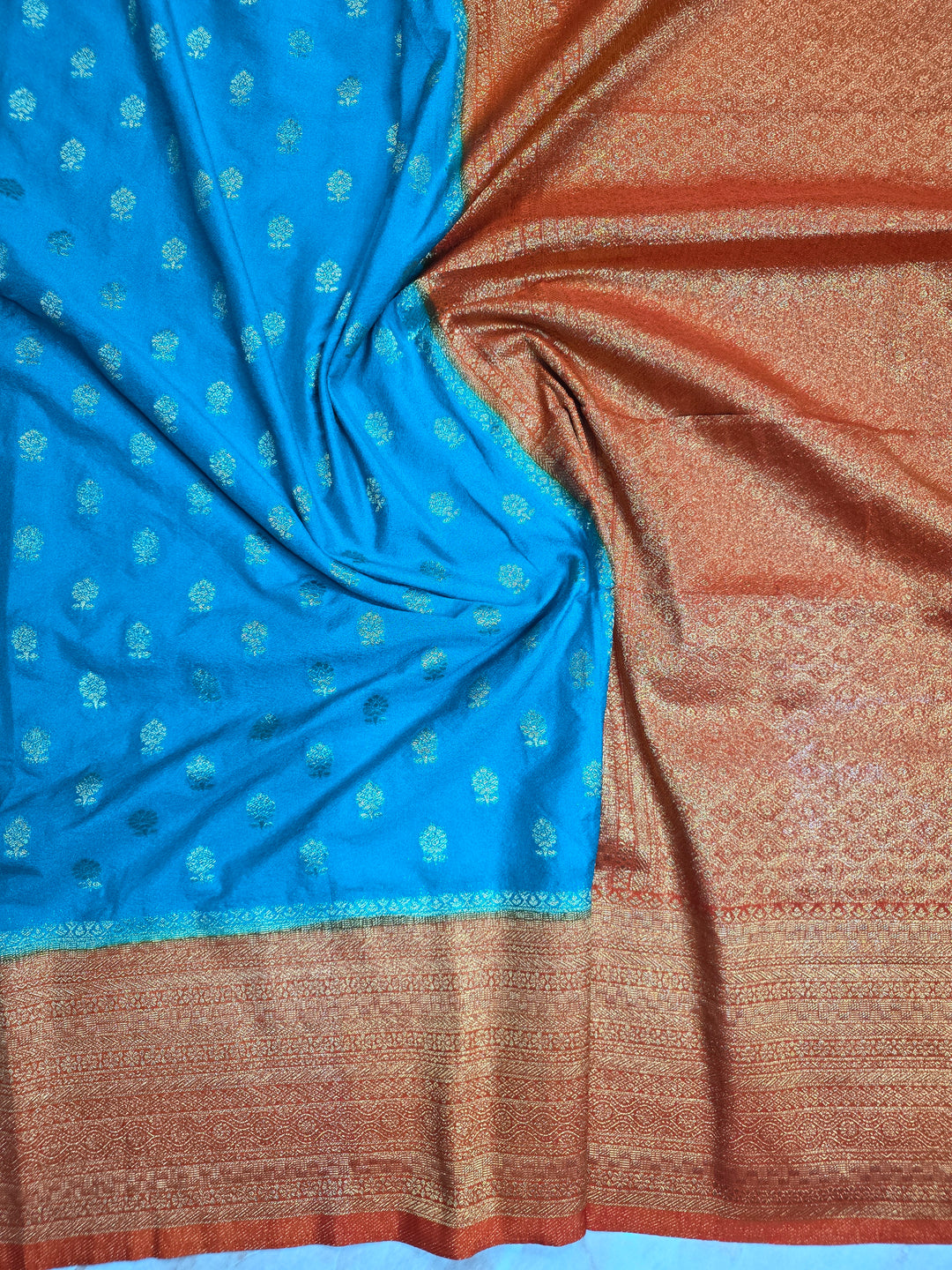 KHADDI GEROGETTE IN TORQUOISE BLUE WITH ORANGE BORDER