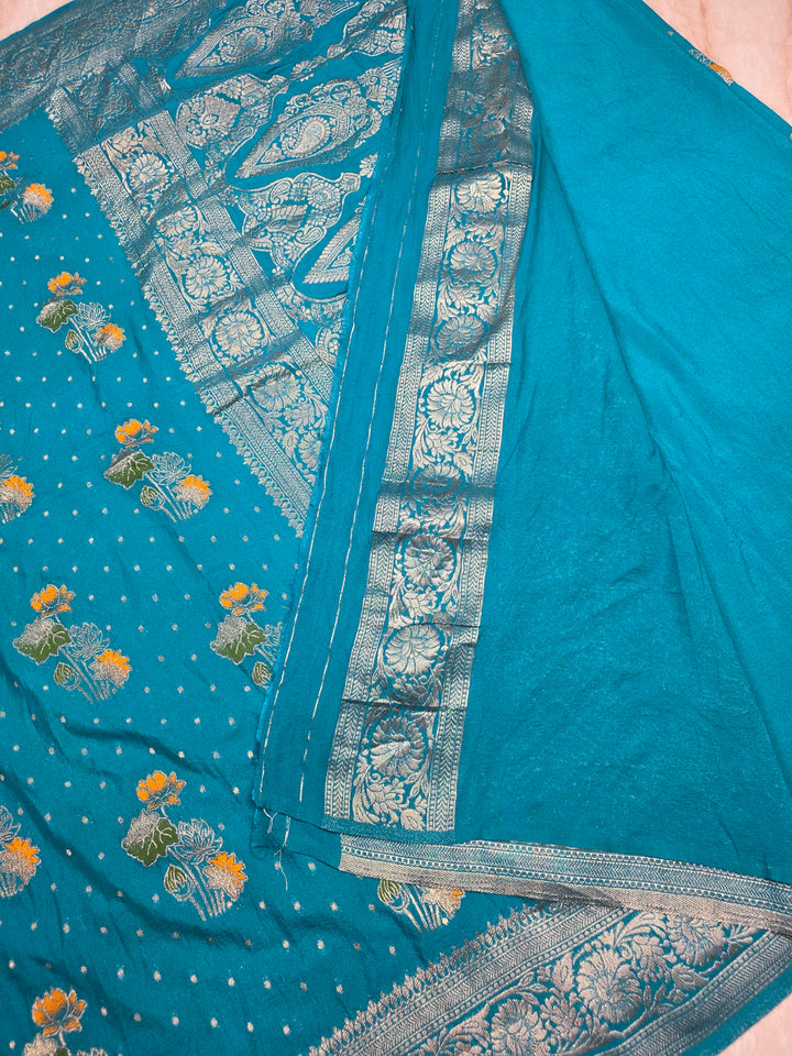 KHADDI GEORGETTE IN FEROZI BLUE WITH PANCHRANG BOOTA