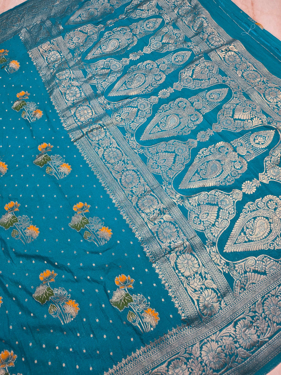 KHADDI GEORGETTE IN FEROZI BLUE WITH PANCHRANG BOOTA