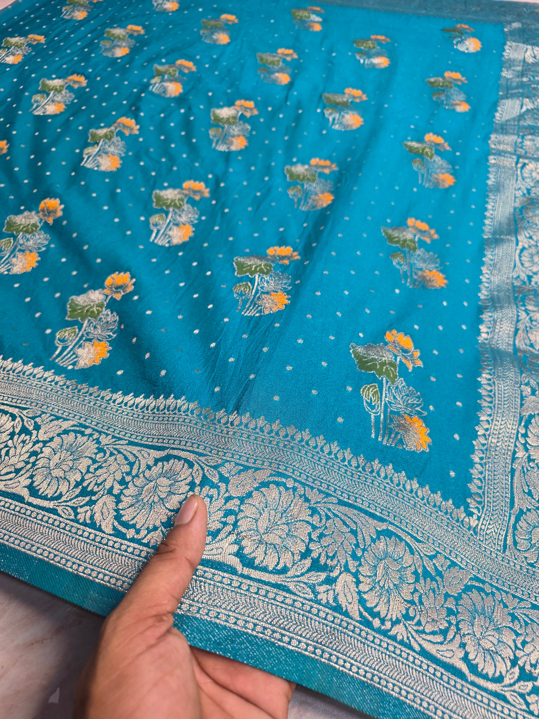 KHADDI GEORGETTE IN FEROZI BLUE WITH PANCHRANG BOOTA