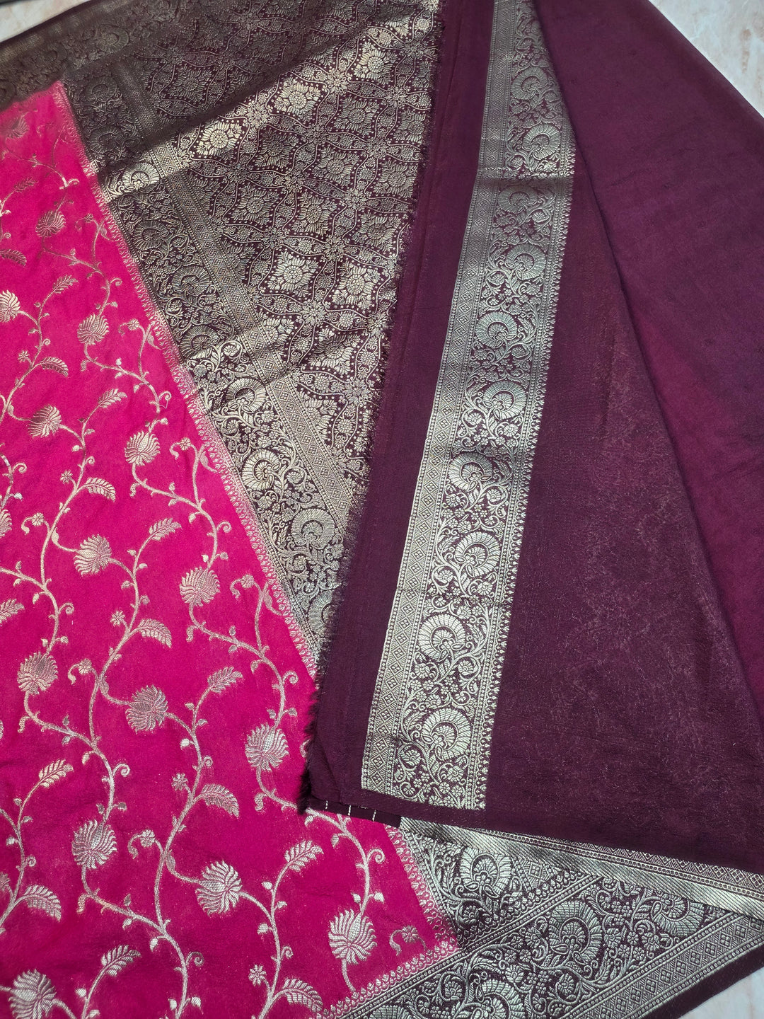 KHADDI GEORGETTE SILVER ZARIWORK IN RANI WITH GARNET BORDER