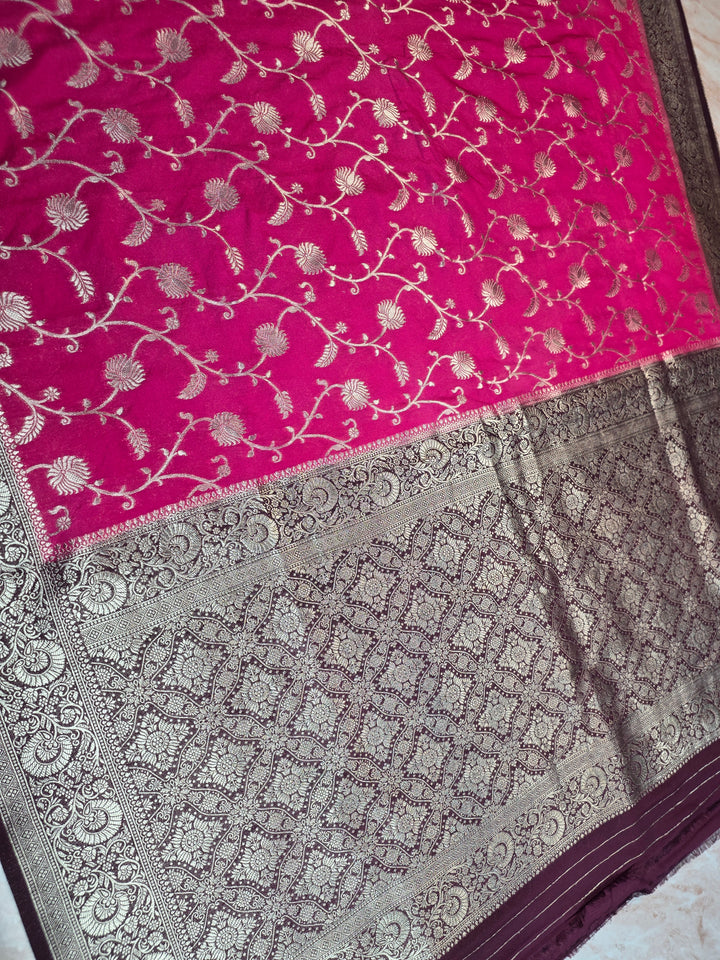 KHADDI GEORGETTE SILVER ZARIWORK IN RANI WITH GARNET BORDER