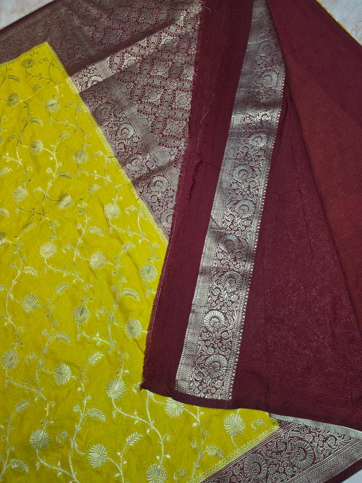 KHADDI GEORGETTE IN YELLOW LIME WITH GARNET BORDER