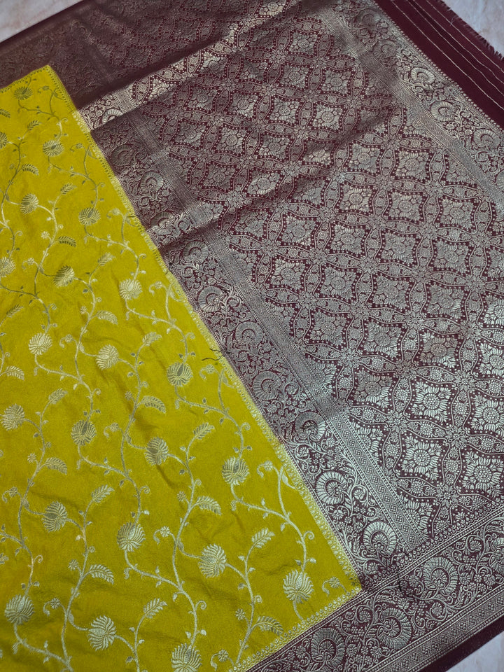 KHADDI GEORGETTE IN YELLOW LIME WITH GARNET BORDER