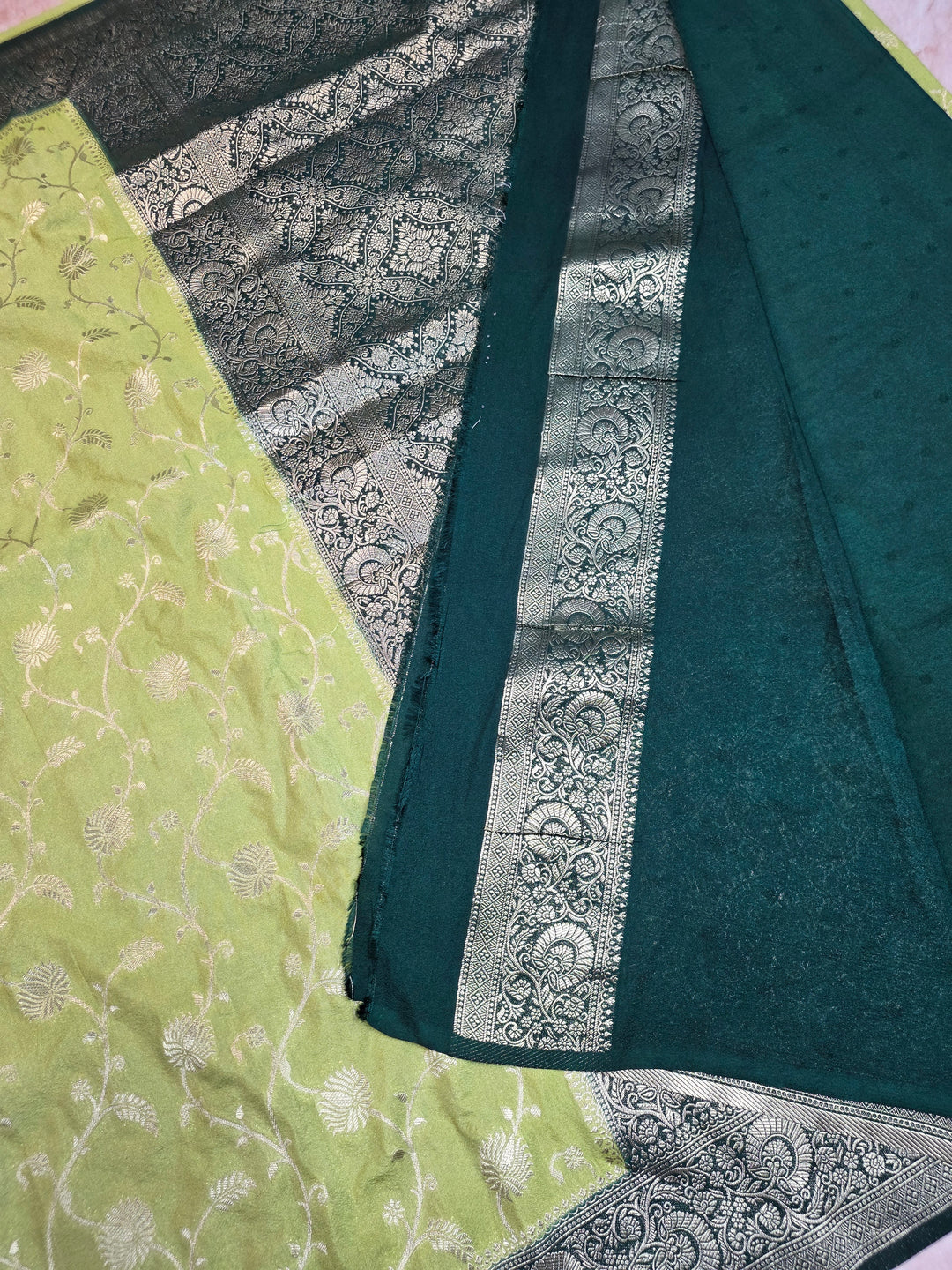 KHADDI GEORGETTE IN PISTA GREEN WITH BOTTLE GREEN BORDER