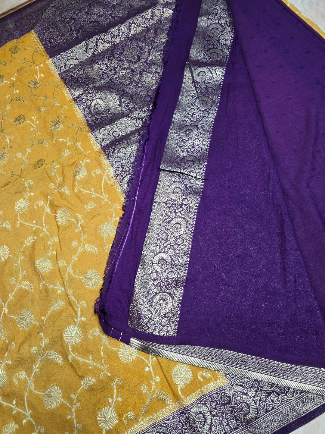 KHADDI GEORGETTE IN BIEGE WITH VIOLET COLOUR BORDER