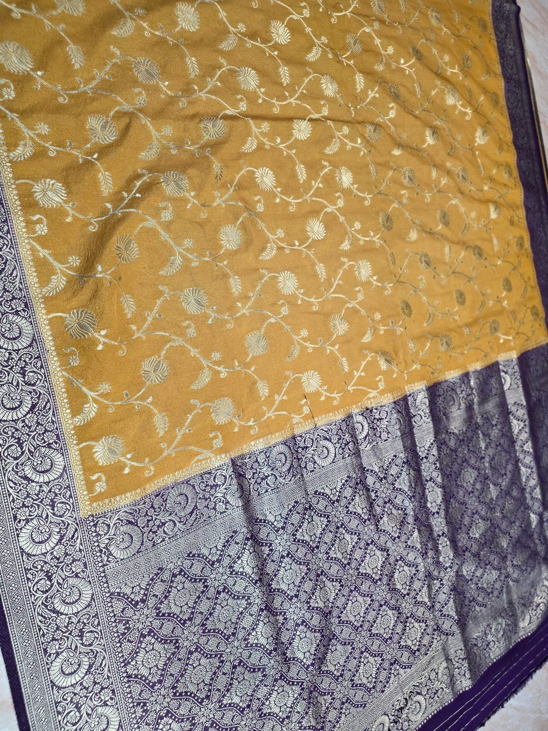 KHADDI GEORGETTE IN BIEGE WITH VIOLET COLOUR BORDER