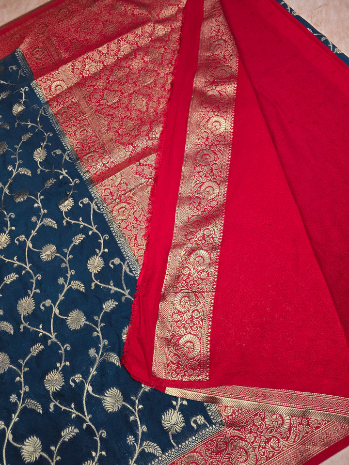 KHADDI GEORGETTE IN DARK BLUE WITH RED BORDER