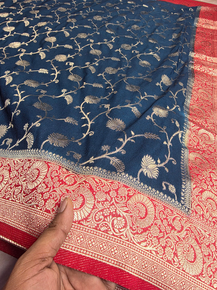 KHADDI GEORGETTE IN DARK BLUE WITH RED BORDER