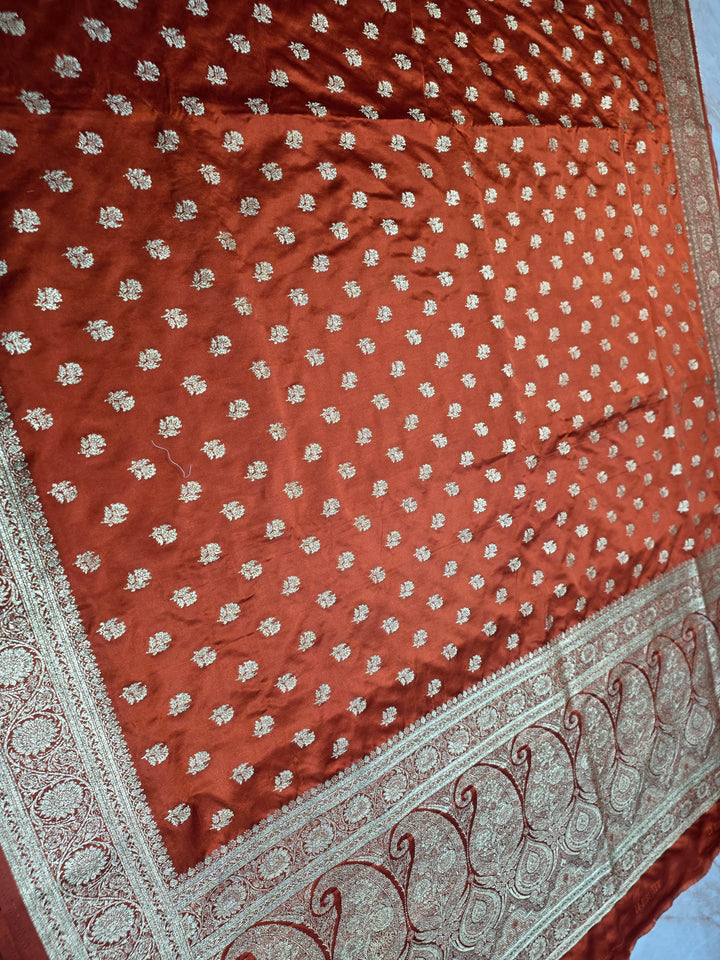 MASHRU KATAN SILK IN RUST ORANGE WITH GOLD ZARIWORK