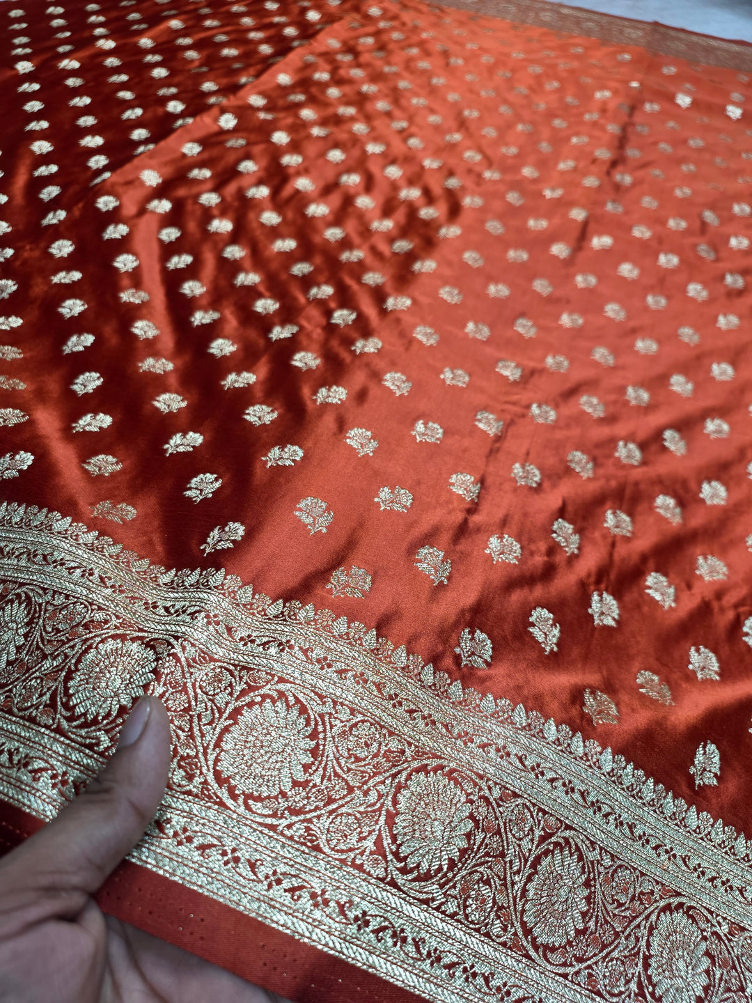 MASHRU KATAN SILK IN RUST ORANGE WITH GOLD ZARIWORK