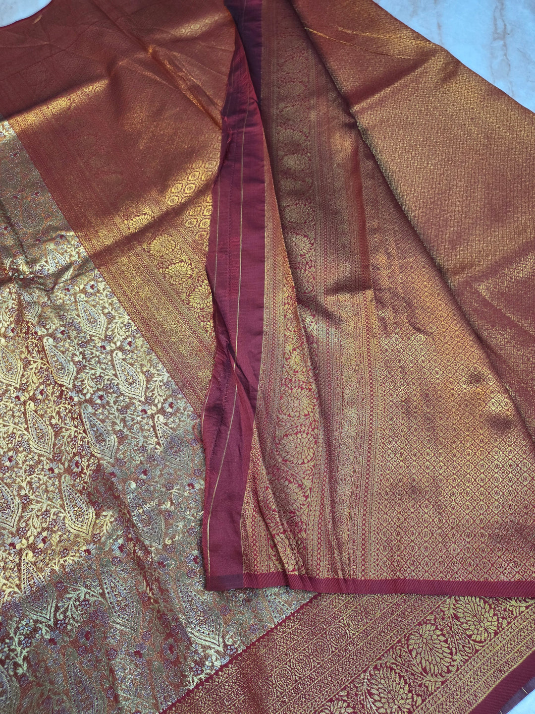 DHARMAVARAM TISU ALFI IN GOLD ZARI WITH RED COLOUR MINAKARI