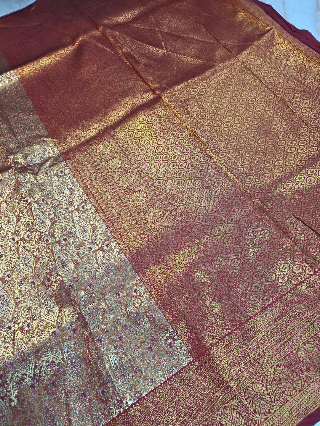 DHARMAVARAM TISU ALFI IN GOLD ZARI WITH RED COLOUR MINAKARI