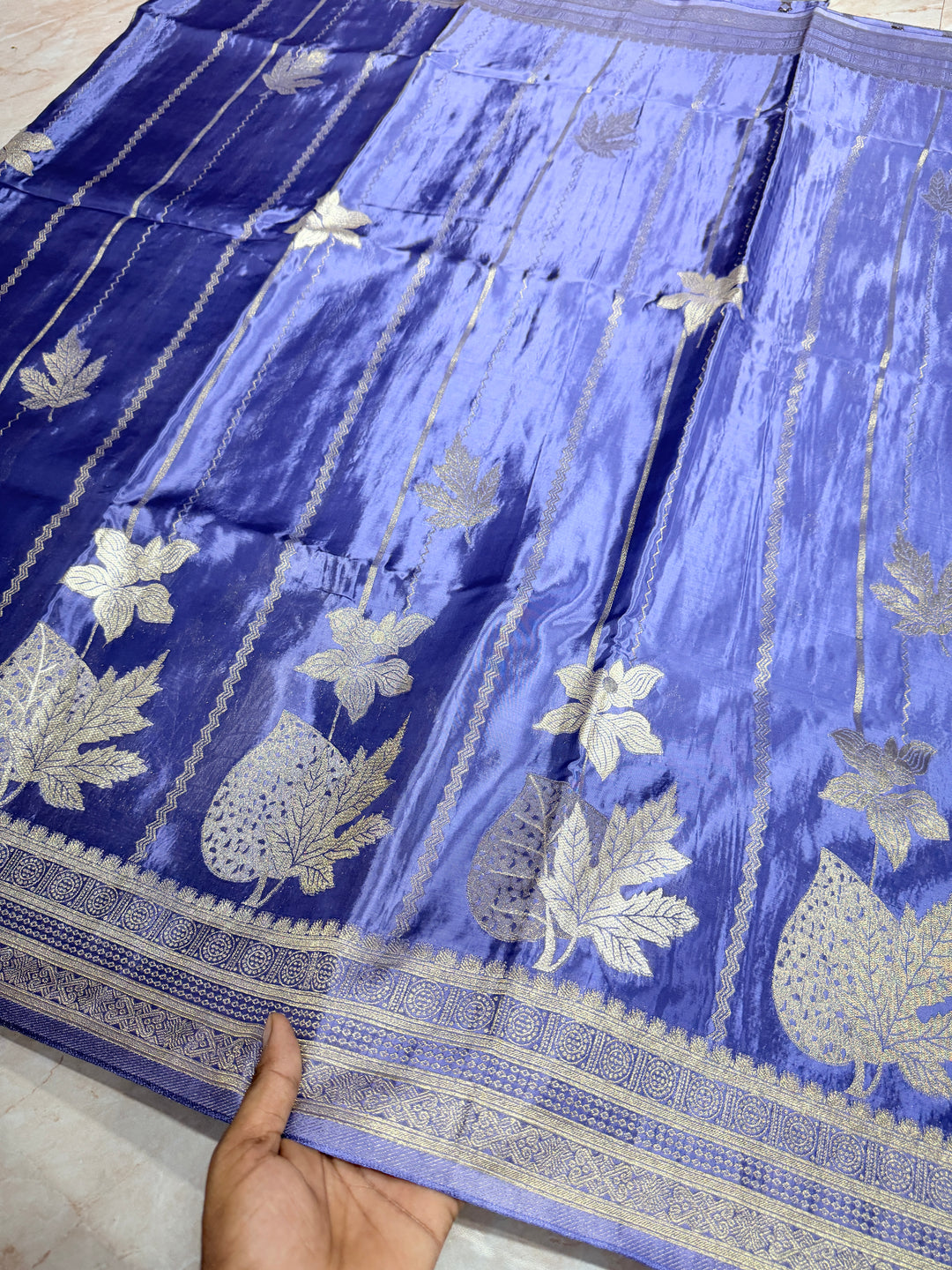 KOREAN SILK IN MATALLIC LIGHT LEVENDER WITH GOLD AND SILVER ZARI WORK