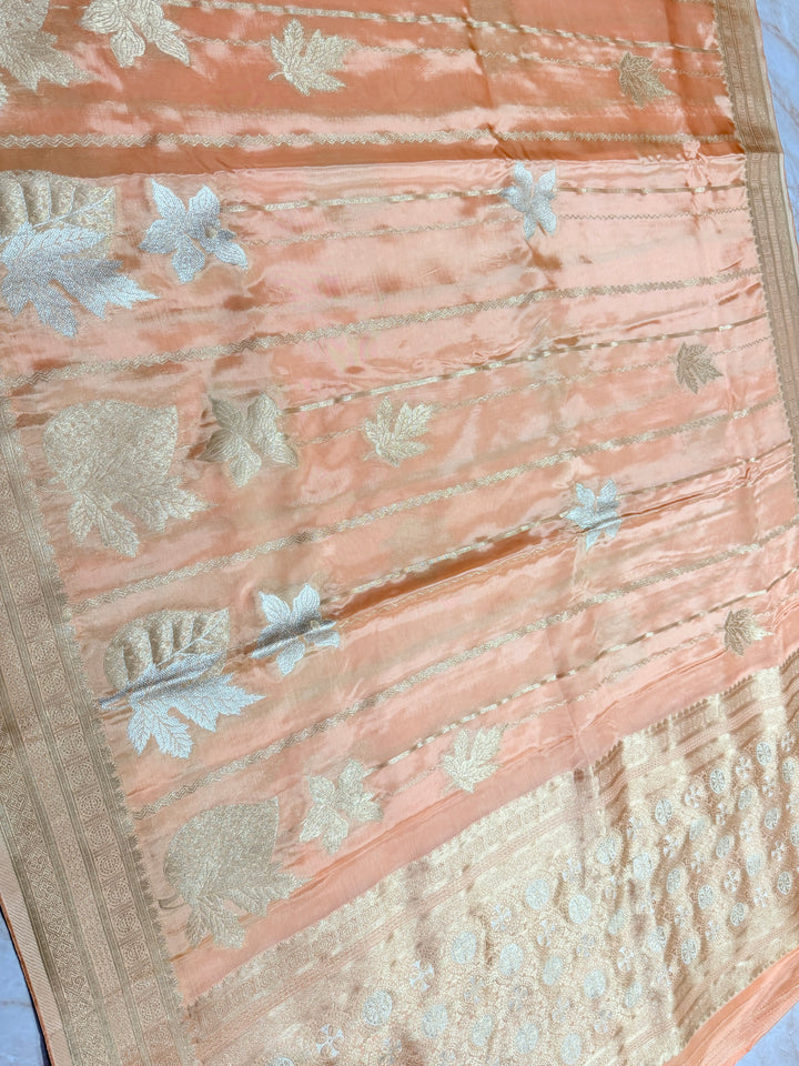 KOREAN SILK IN PEACH ORANGE WITH GOLD AND SILVER ZARI WORK