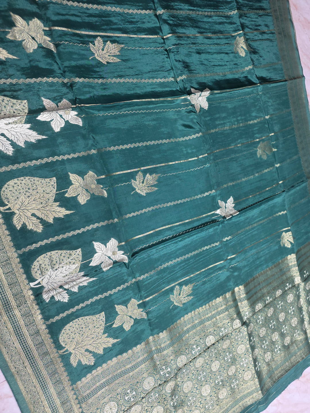 KOREAN SILK IN MATALLIC BOTTLE GREEN WITH GOLD AND SILVER ZARI WORK