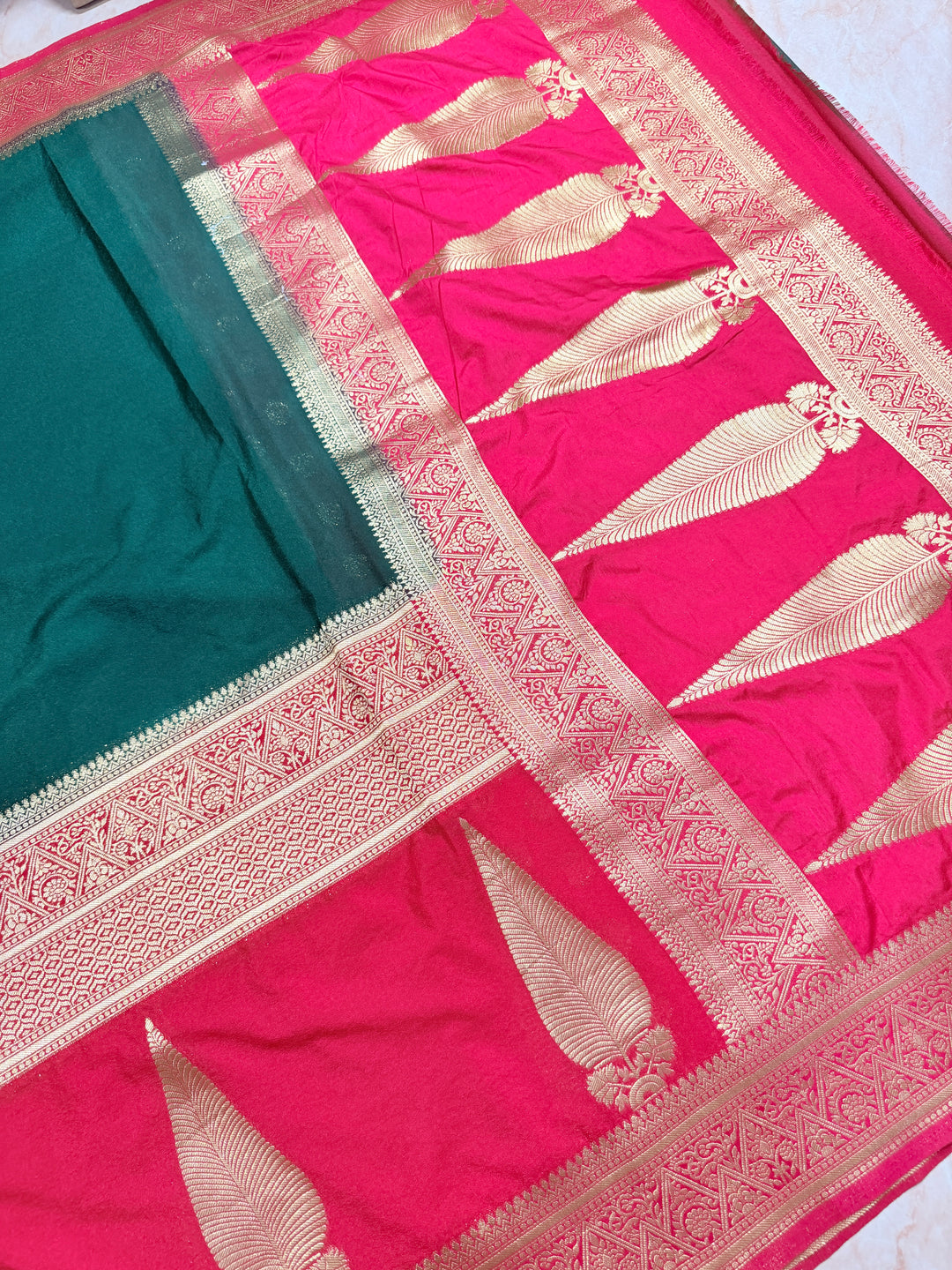 KHADDI GEORGETTE WITH KAIRI BOOTA IN BOTTLE GREEN AND CHERRY RANI BORDER