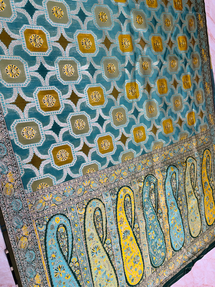 TEAL GREEN WITH MINAKARI MUTICOLOUR DETALING RANGKAAT SAREE IN SEMI SOFT SILK