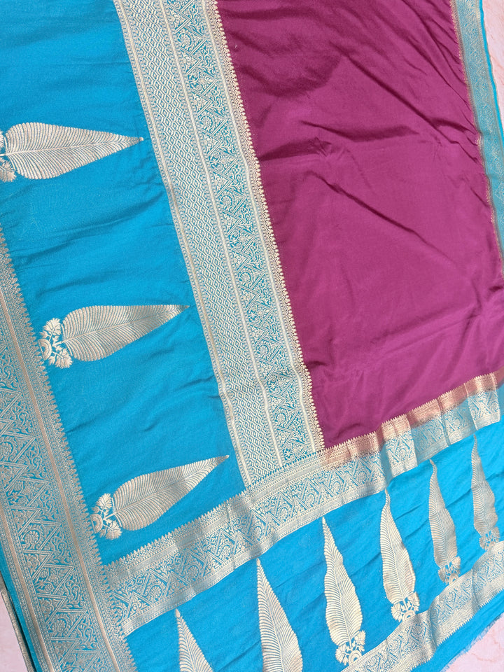 KHADDI GEORGETTE WITH KAIRI BOOTA IN MAGENTA AND DEEP SKY BLUE BORDER