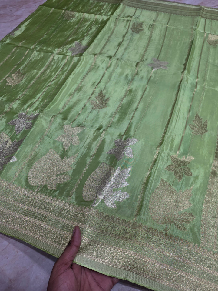 KOREAN SILK IN PISTA GREEN  WITH GOLD AND SILVER ZARI WORK