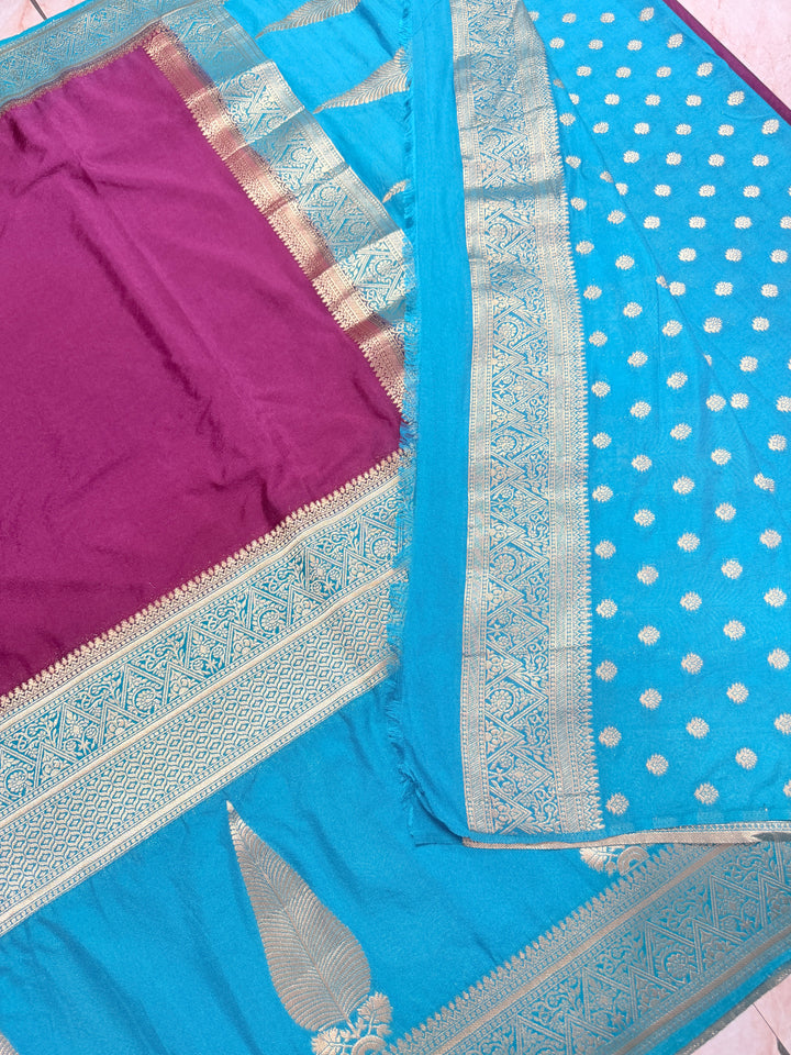 KHADDI GEORGETTE WITH KAIRI BOOTA IN MAGENTA AND DEEP SKY BLUE BORDER