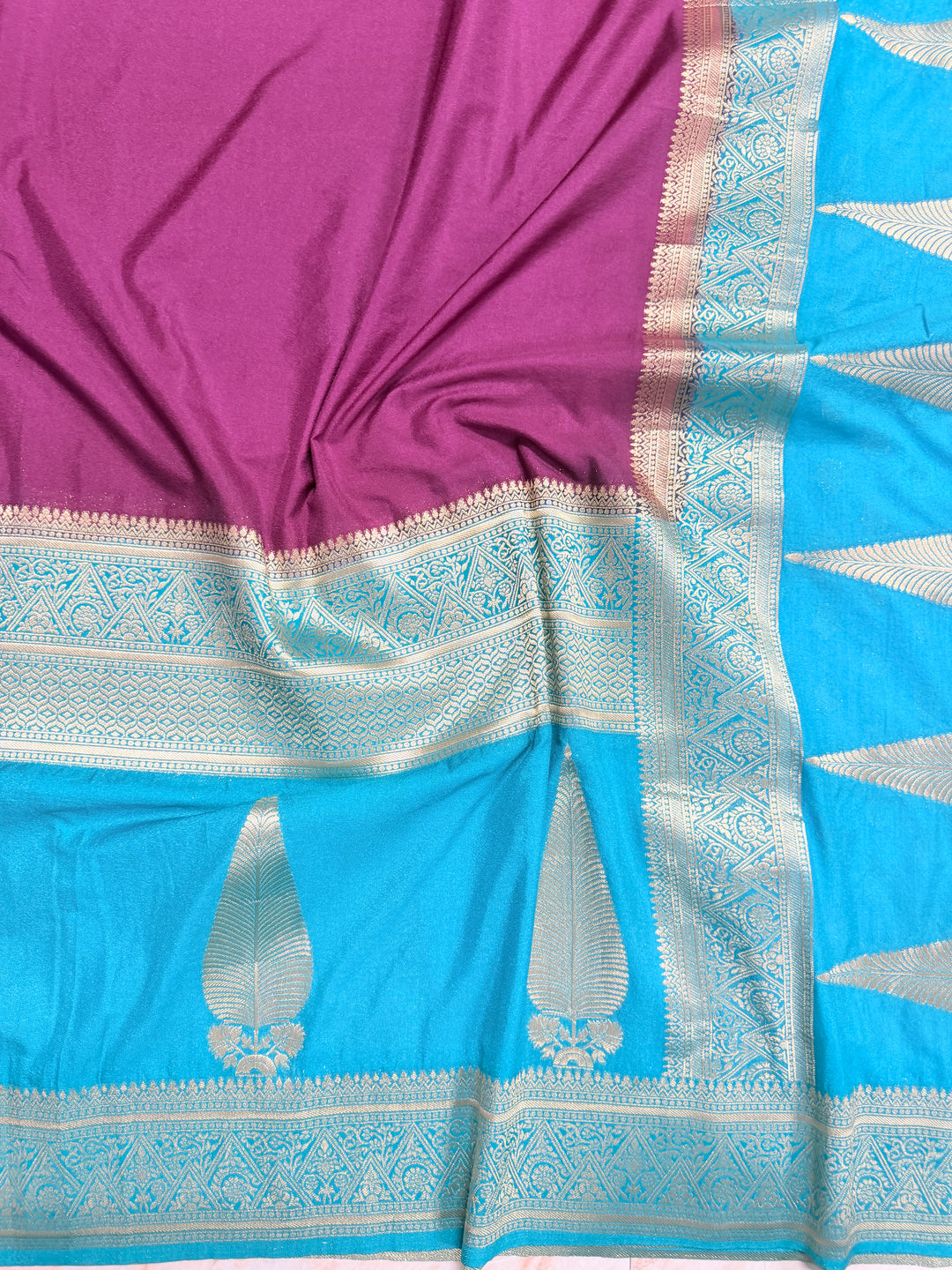 KHADDI GEORGETTE WITH KAIRI BOOTA IN MAGENTA AND DEEP SKY BLUE BORDER