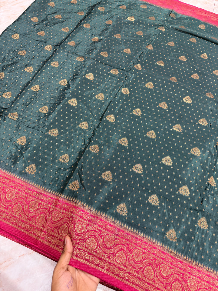 PREMIUM SEMI KHADDI VISCOSE GEORGETTE SAREE IN BOTTLE GREEN COLOUR SHADE WITH CHERRY  BORDER