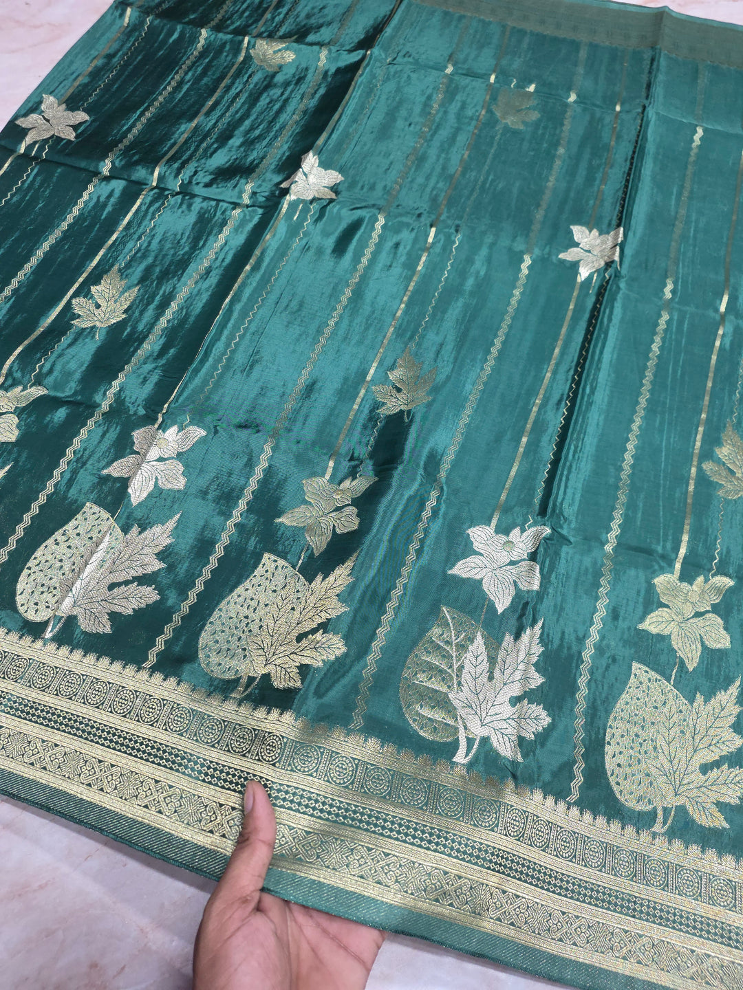 KOREAN SILK IN MATALLIC BOTTLE GREEN WITH GOLD AND SILVER ZARI WORK