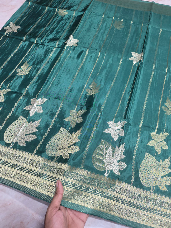 KOREAN SILK IN MATALLIC BOTTLE GREEN WITH GOLD AND SILVER ZARI WORK