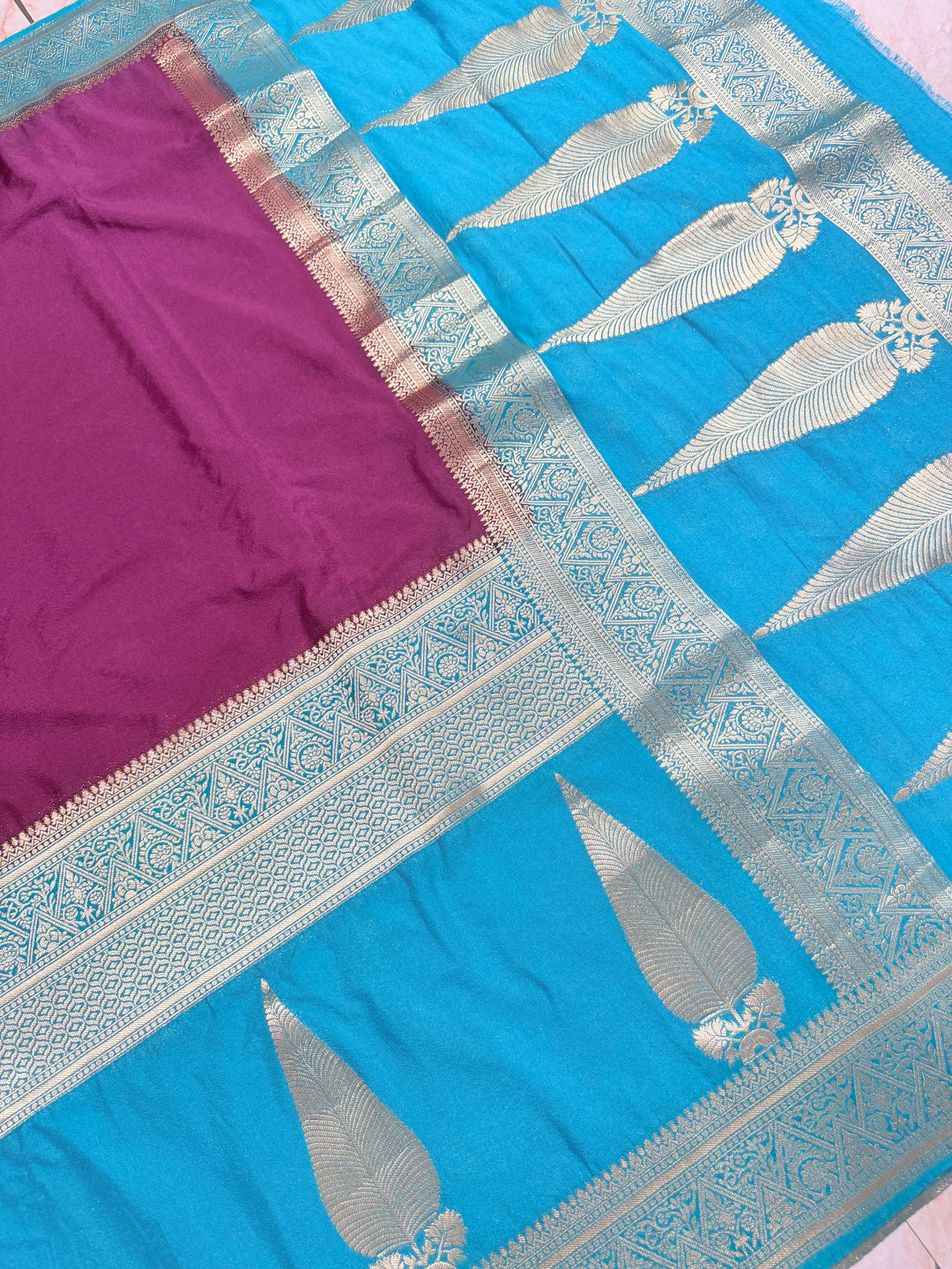 KHADDI GEORGETTE WITH KAIRI BOOTA IN MAGENTA AND DEEP SKY BLUE BORDER