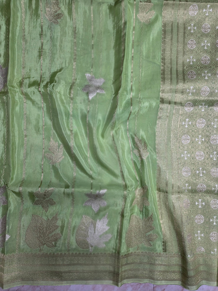 KOREAN SILK IN PISTA GREEN  WITH GOLD AND SILVER ZARI WORK