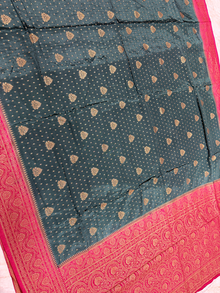 PREMIUM SEMI KHADDI VISCOSE GEORGETTE SAREE IN BOTTLE GREEN COLOUR SHADE WITH CHERRY  BORDER