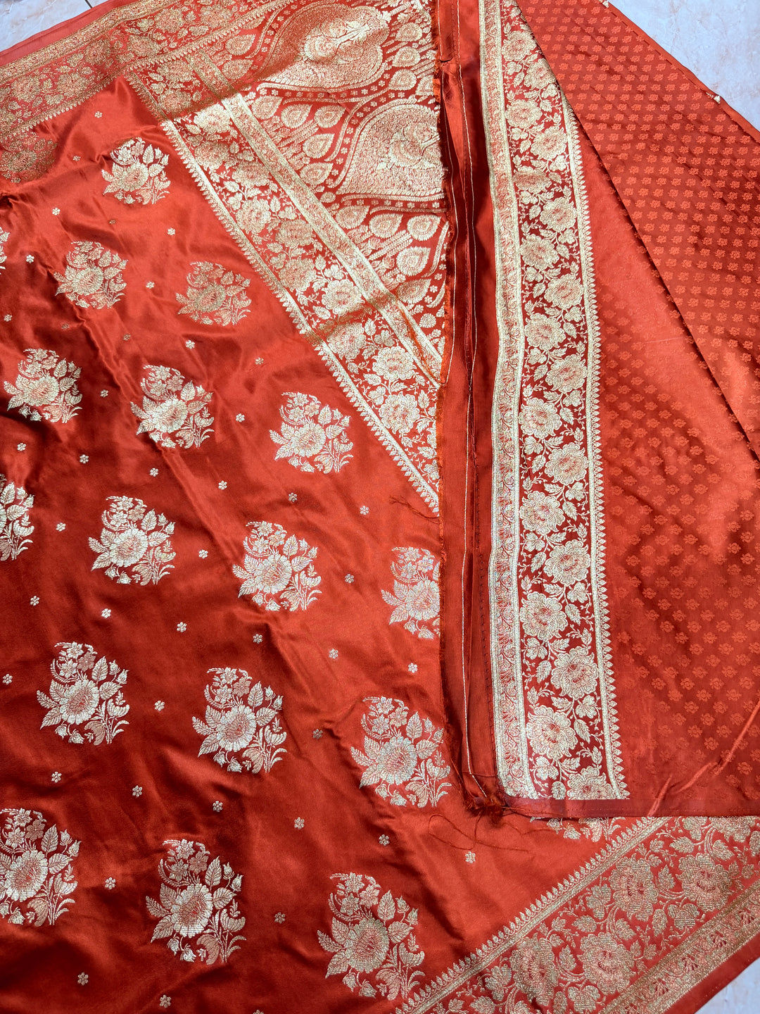 MASHRU KATAN SILK IN ORANGE WITH GOLD ZARIWORK FLORAL BORDER