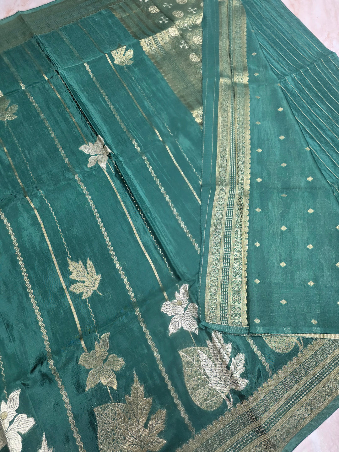 KOREAN SILK IN MATALLIC BOTTLE GREEN WITH GOLD AND SILVER ZARI WORK