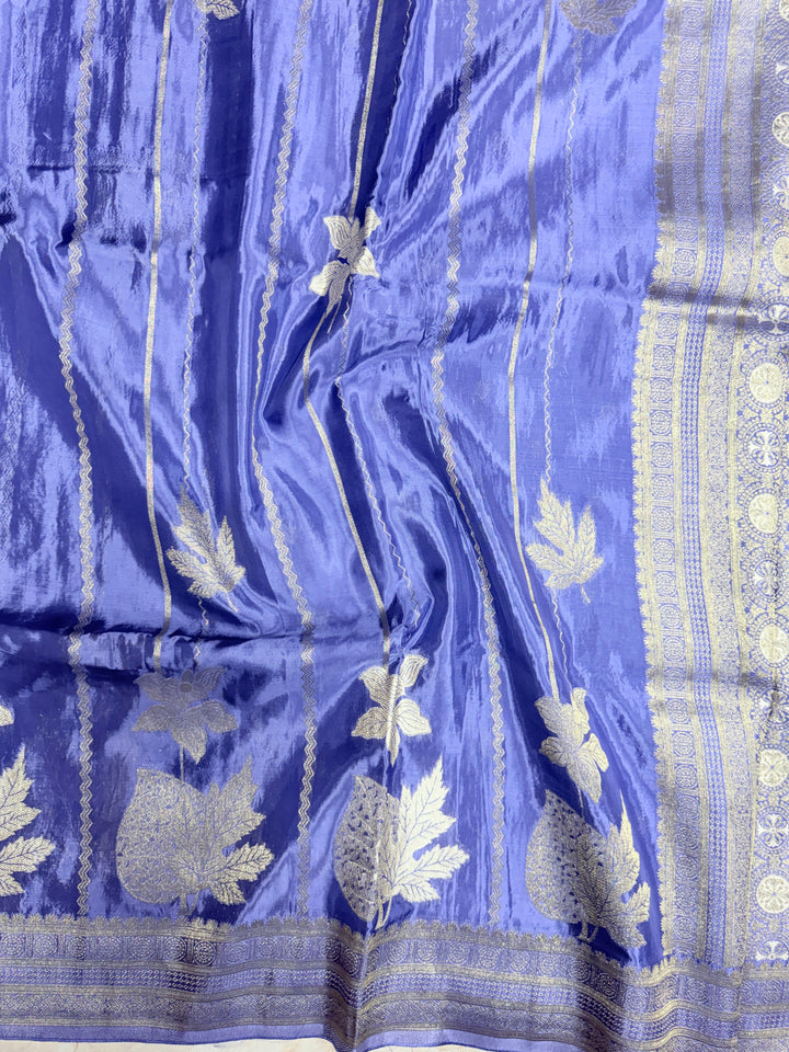 KOREAN SILK IN MATALLIC LIGHT LEVENDER WITH GOLD AND SILVER ZARI WORK