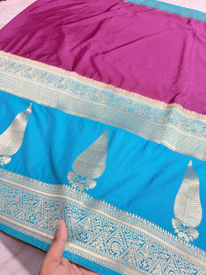 KHADDI GEORGETTE WITH KAIRI BOOTA IN MAGENTA AND DEEP SKY BLUE BORDER