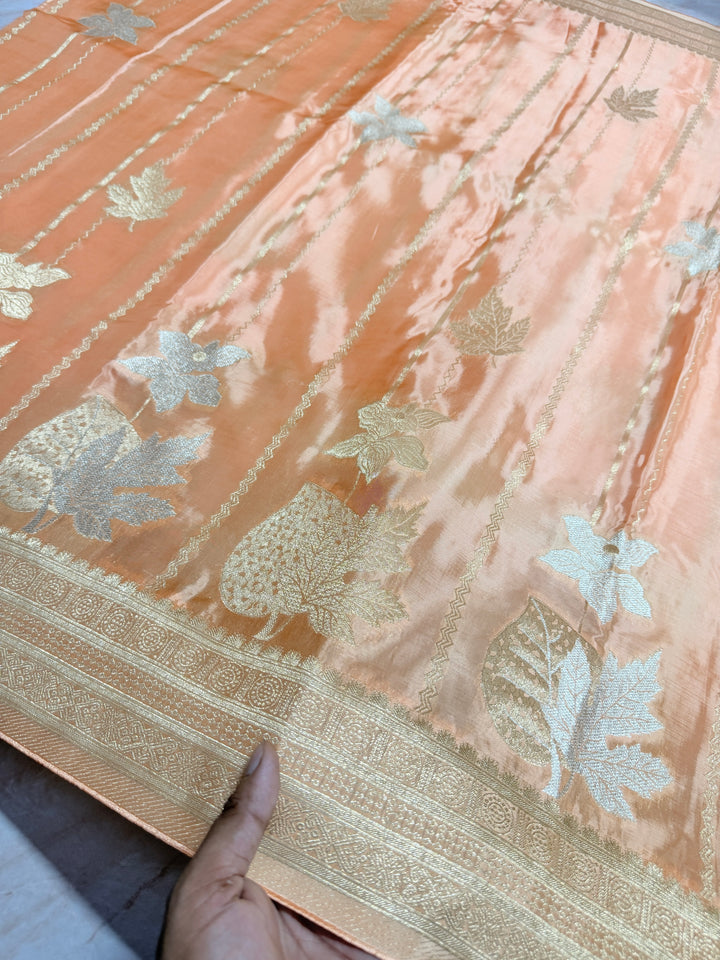 KOREAN SILK IN PEACH ORANGE WITH GOLD AND SILVER ZARI WORK