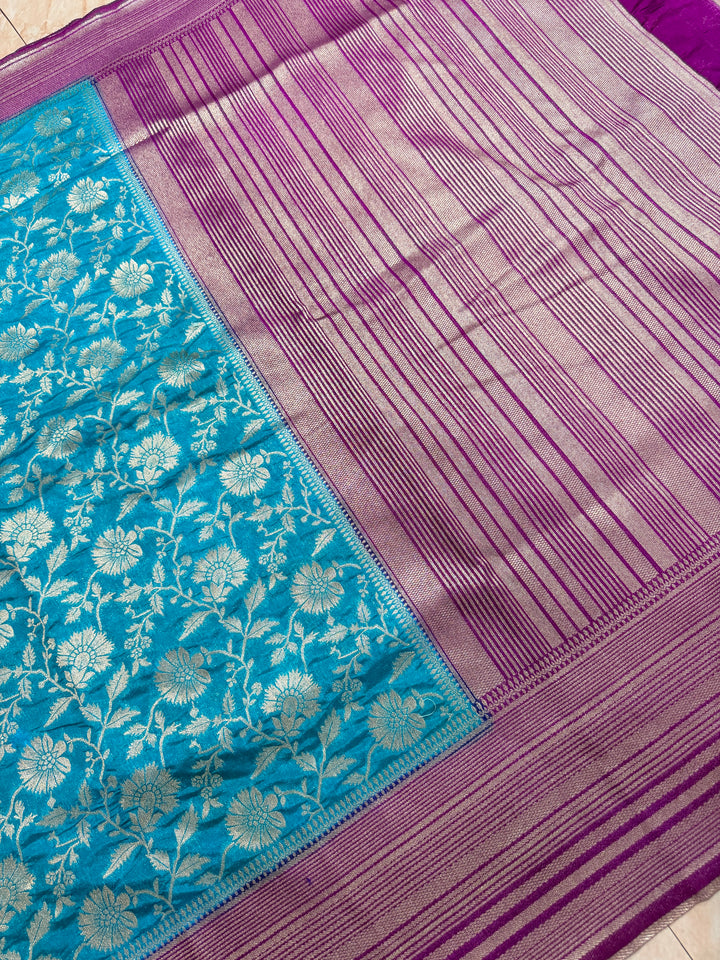 PAPER SILK WITH FLORAL JAAL DESIGN IN SKY BLUE COLOUR SHADE