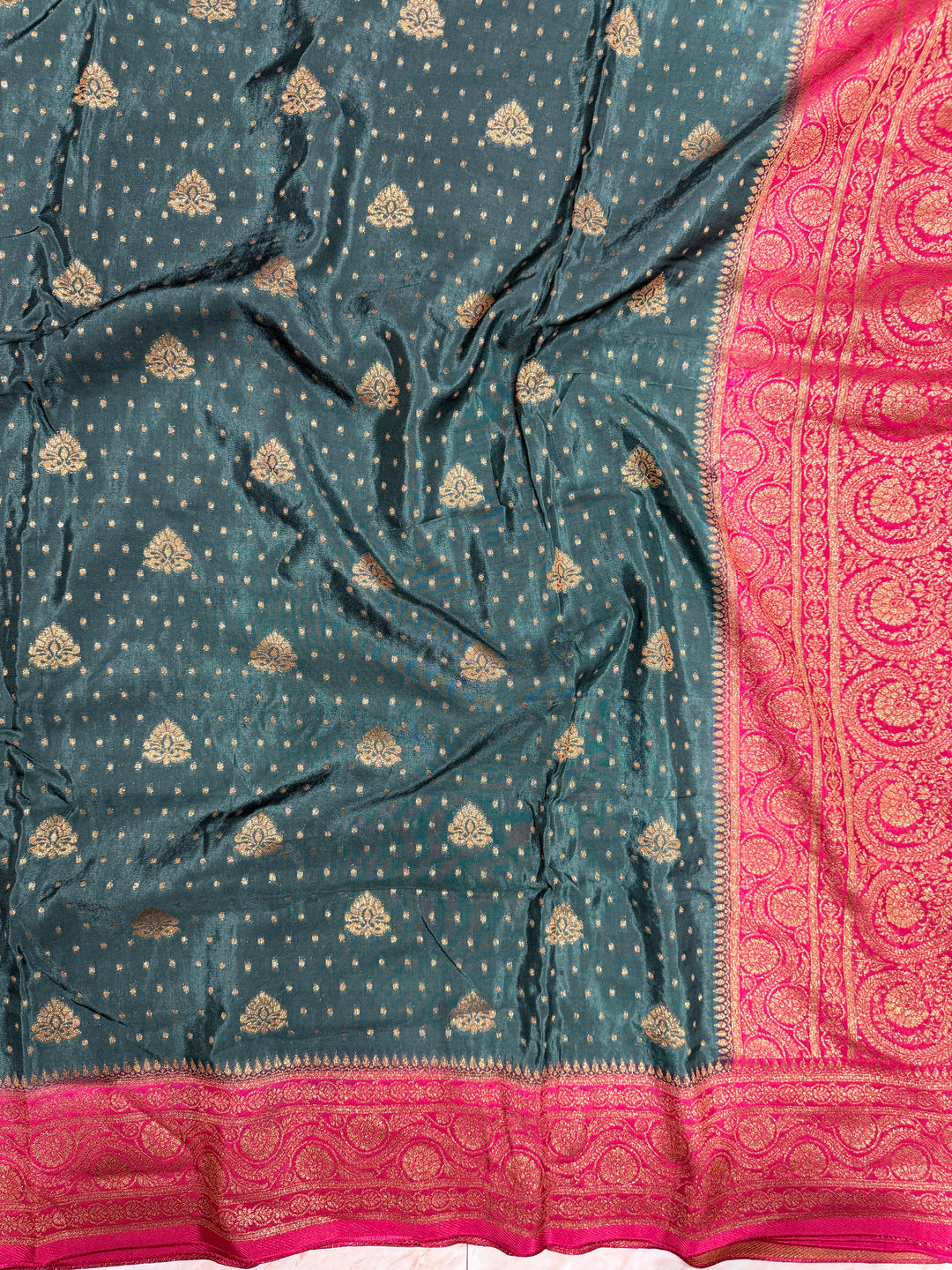 PREMIUM SEMI KHADDI VISCOSE GEORGETTE SAREE IN BOTTLE GREEN COLOUR SHADE WITH CHERRY  BORDER